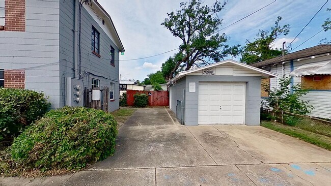 Building Photo - Move In Special: $150 off first full month.