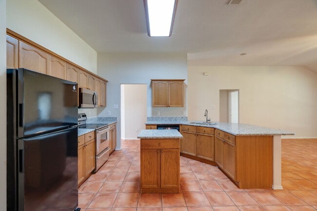 Building Photo - "Beautiful Single-Story Featuring an Office, Open-Concept Design, Dual Living Areas and a Large O...