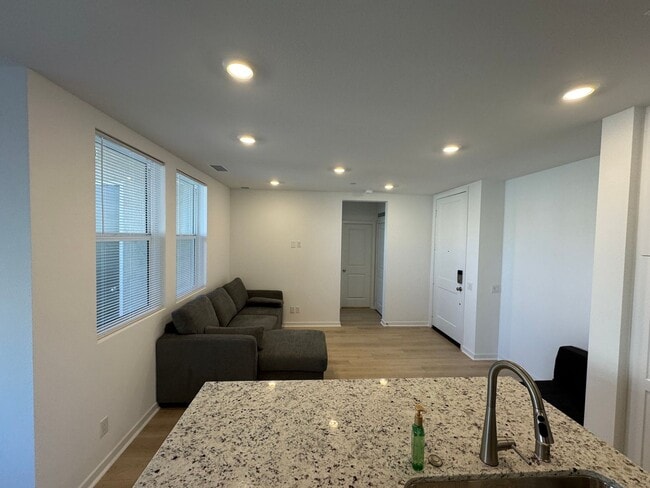 Building Photo - Brand New 1 bedroom, 1 bath Townhome with 2 car tandem garage for lease