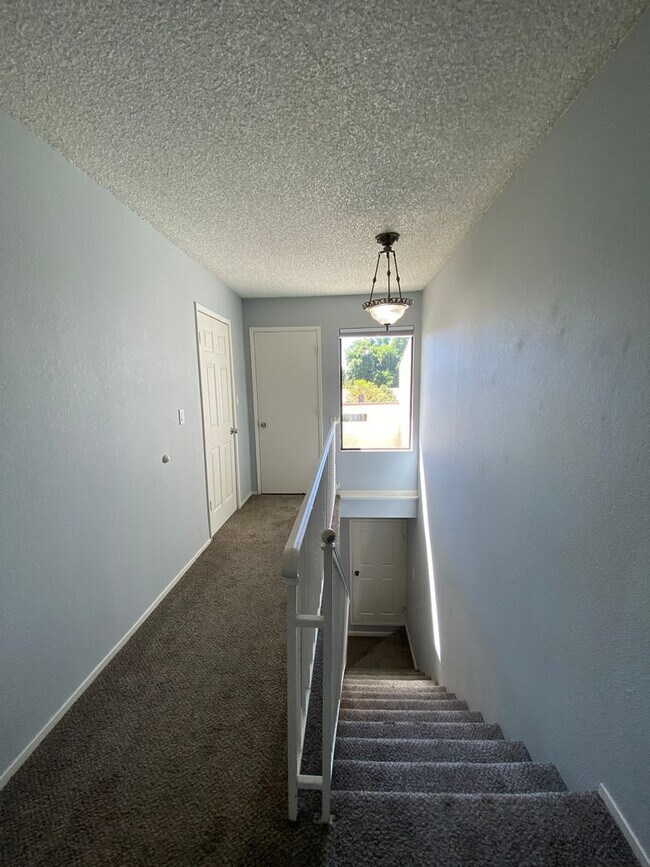Building Photo - Large Centrally Located Two Story Condo wi...