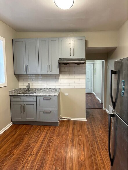 Building Photo - 3242 W 38th Pl