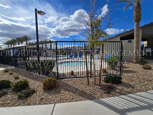 Building Photo - Gated~ 2 Bedroom Townhome w/2 Car Garage~MUST SEE!