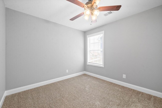 Building Photo - Pet Friendly Three Bedroom with Bonus!