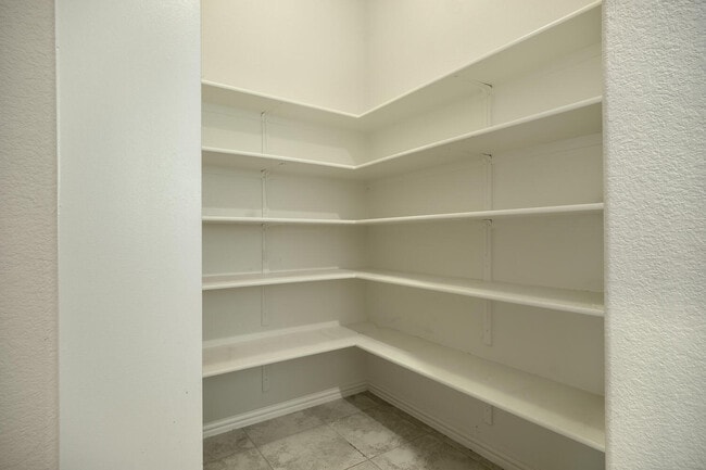 Building Photo - 8333 Paola St