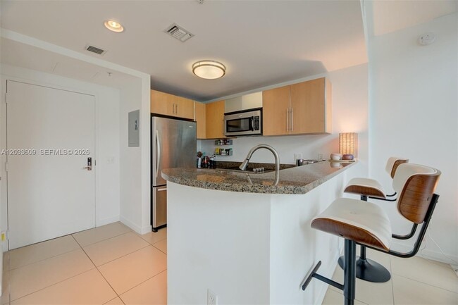 Building Photo - 300 S Biscayne Blvd