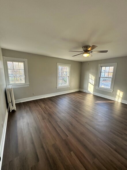 Bedroom 1 with ceiling fan - 106 S Raleigh St
