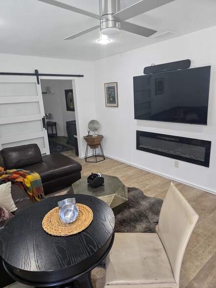 In wall 65 inch TV, sound bar and electric fireplace - 3622 Wild Oats Ln