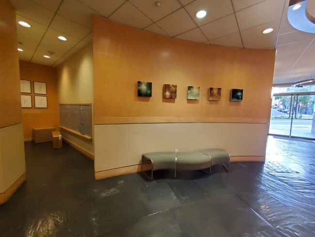 Building Photo - Downtown High-Rise Studio with parking and in-home laundry