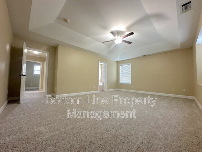 Building Photo - 6223 Woodland Commons Dr