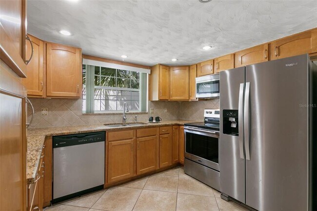 Building Photo - 7114 Parrot Dr