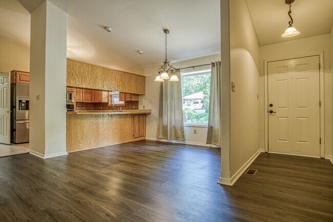 Building Photo - This beautiful home is located in a quiet private neighborhood and perfect for a serene living at...