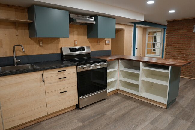 Kitchen with all new appliances - 2507 3rd St NE