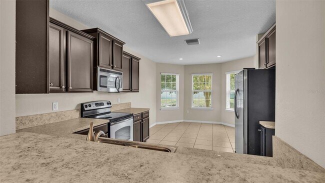Building Photo - 6838 Glenbrook Dr