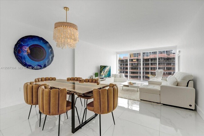 Building Photo - 10275 Collins Ave
