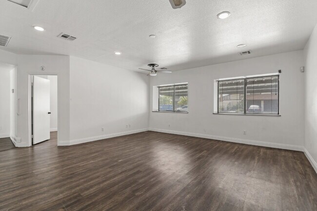 Building Photo - Welcome to your entertainers dream home with solar and pool service included!