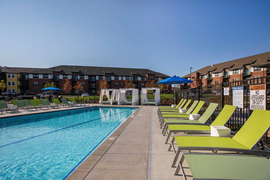 Soak up some sun after a long day with our private swimming pool, lounge chairs and resort-style cabanas. - Ascend at Woodbury