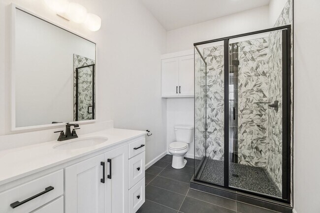 Building Photo - Minimalist Magic: 2-Bed Apartment Over Sel...