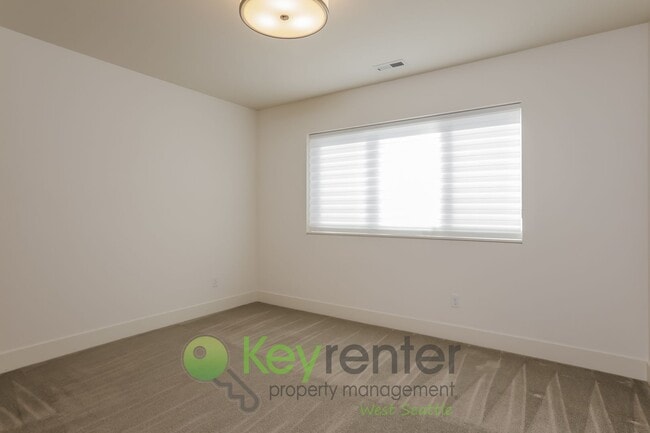 Building Photo - Spacious Living with Balconies, Deck, and Private Yard