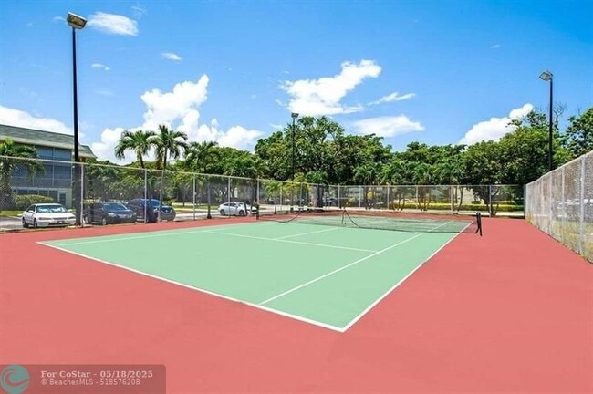 Building Photo - 4990 E Sabal Palm Blvd