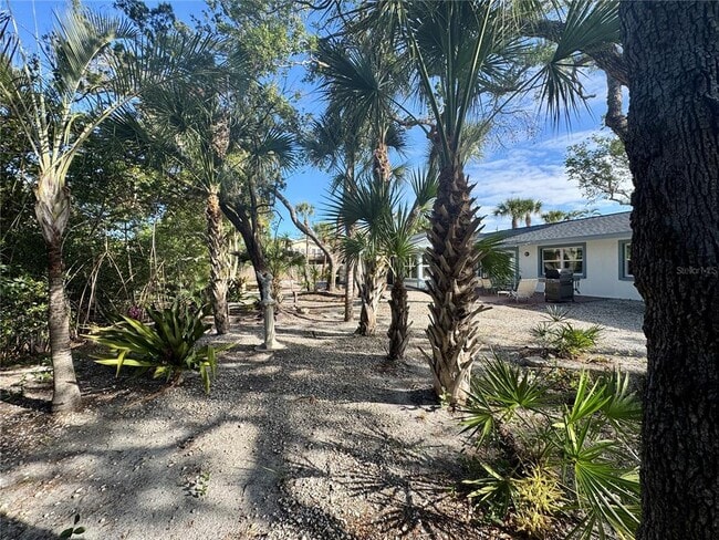 Building Photo - 7372 Melaleuca Way