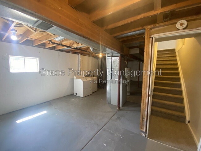 Building Photo - 8917 E Chenango Ave