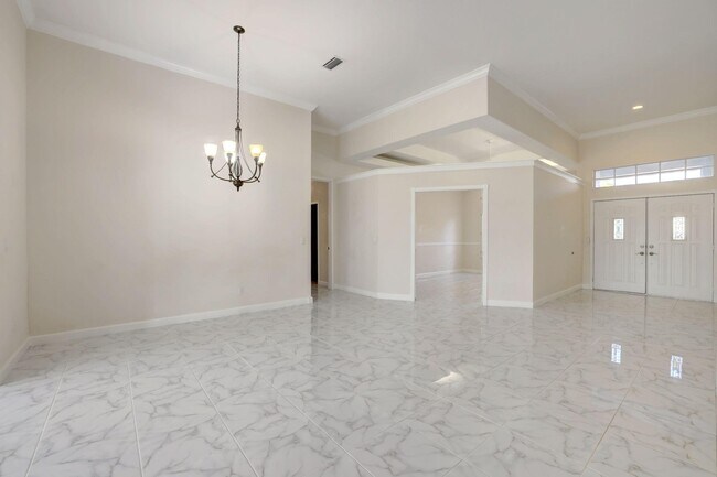 Building Photo - 8028 Plantation Lakes Dr
