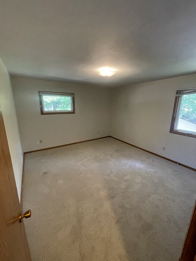 Bedroom 2 with new carpet - 2630 Norwood Ln N