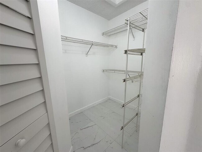Building Photo - 10687 Royal Palm Blvd