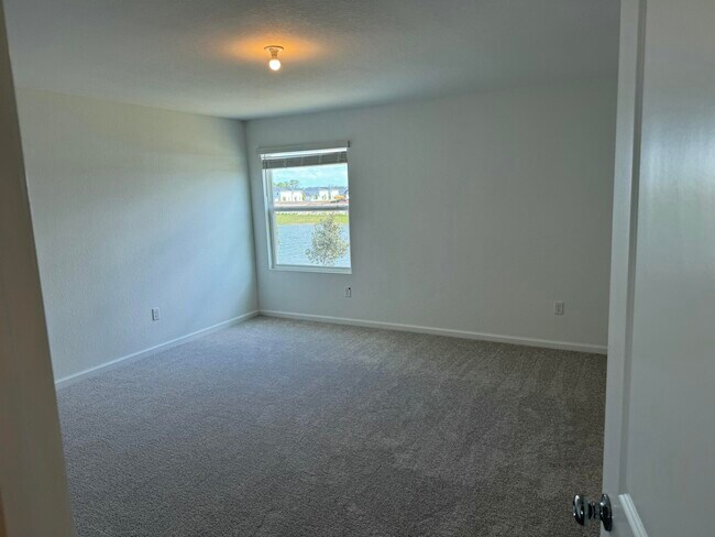 Building Photo - 10856 NW Everbreeze Dr