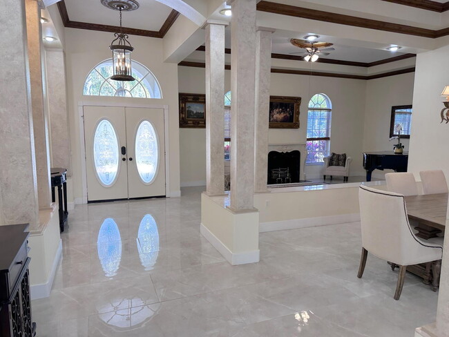 Building Photo - Stunning 5-Bedroom Pool Home in Gated Spyg...