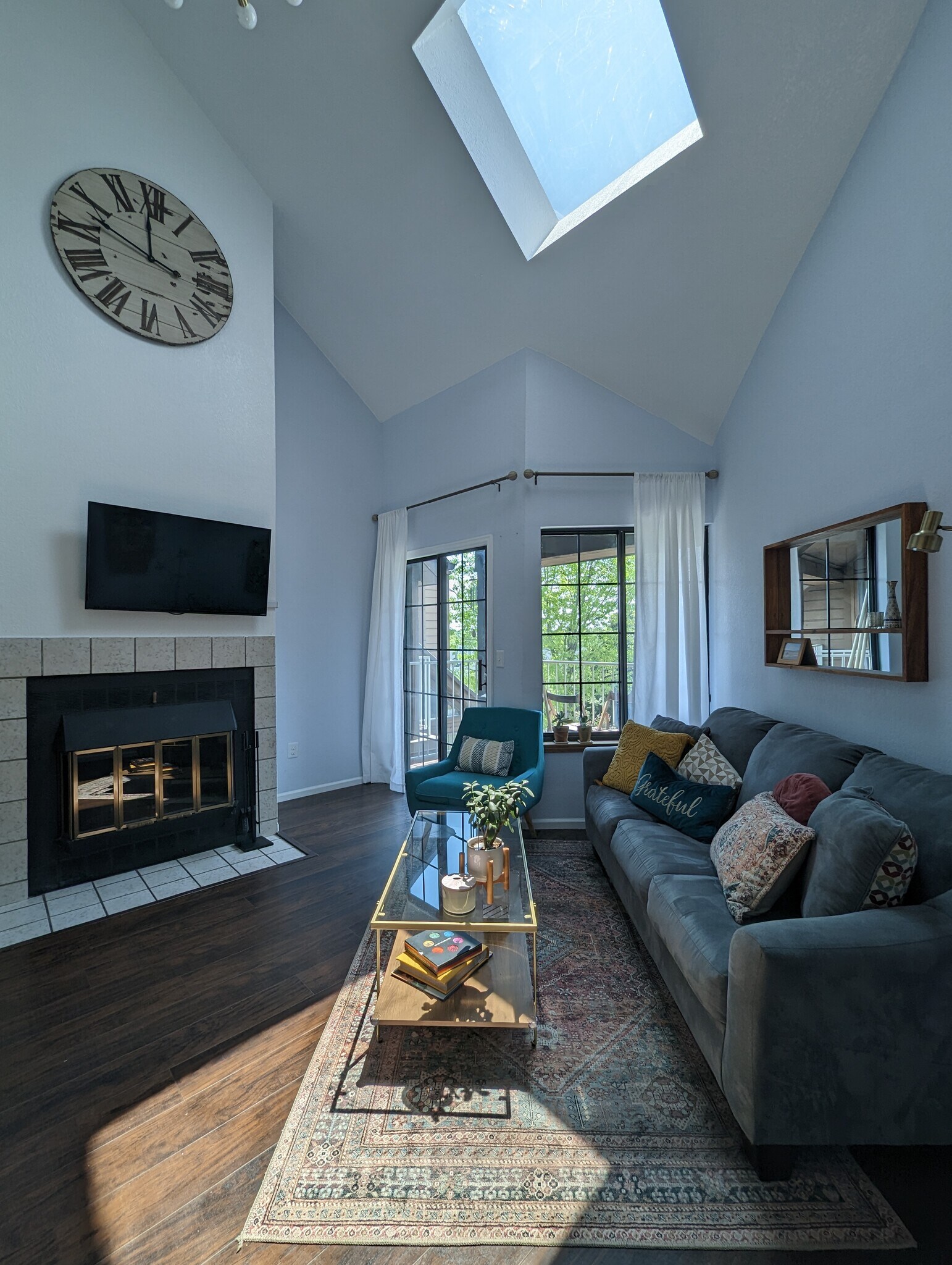 Natural wood fireplace for cozy winter nights. - 842 S Vance St