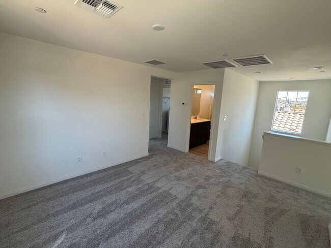 Building Photo - Modern Inspirada Living – 4 Bed Home with Loft & Downstairs Suite