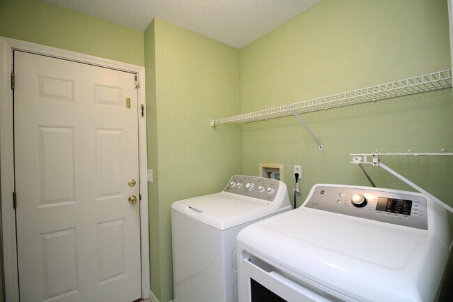 Building Photo - Spacious Oak Meadows Home in Milton with Multiple Living Areas, Fenced Yard & 1/2 Off First Month...