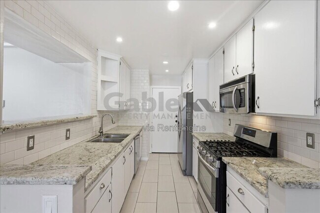 Building Photo - 23554 Newhall Ave