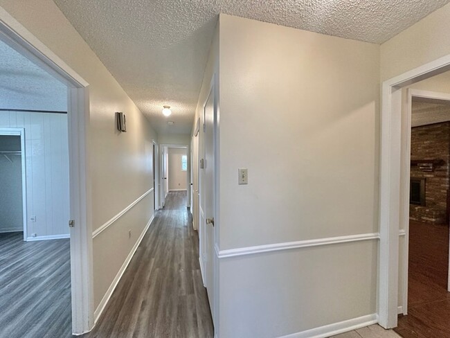 Building Photo - Spacious 4-Bedroom Home on a Corner Lot wi...