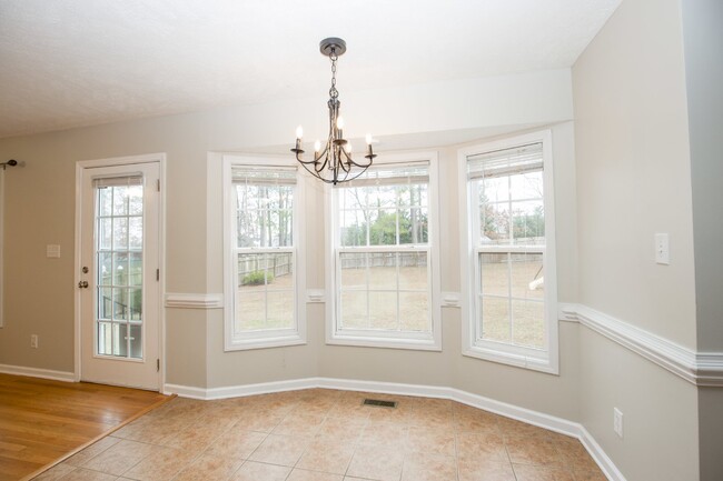 Building Photo - "Charming 4-Bedroom Home with Granite Coun...