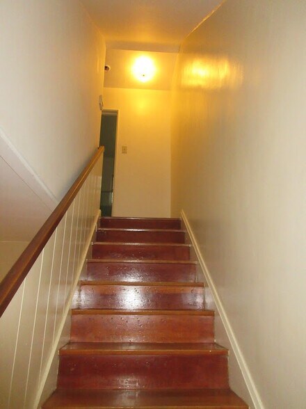 Staircase to Bedrooms and Bathroom - 5271 Village Grn