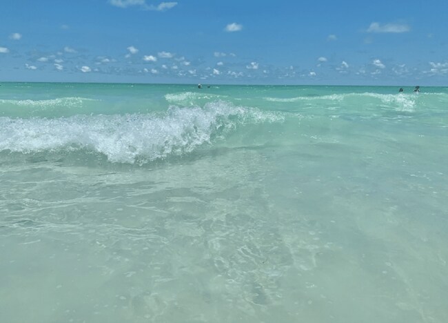Building Photo - Meticulous Gulf front condo with unobstructed views of the clear blue water.