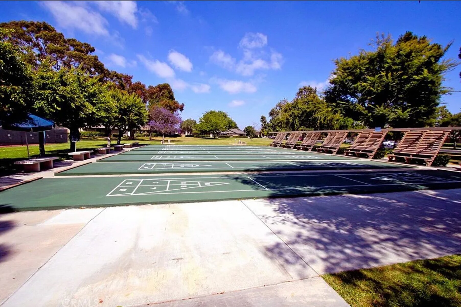 Shuffleboard with seating. - 8566 Larkhall Cir
