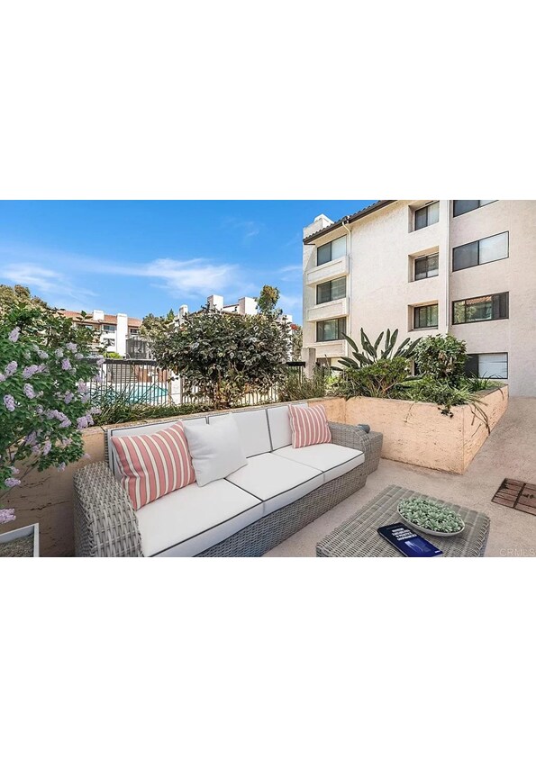 Patio looking towards pool. The furniture shown is not there. - 5705 Friars Rd