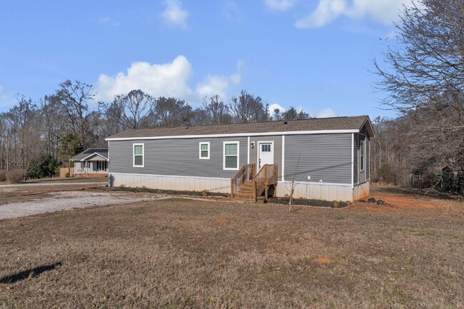 Building Photo - Spacious 2BR, 2BA home on 1.5 acres with Extra Storage - $1695/mo rent***