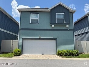 Building Photo - 7430 Beach Walk Place