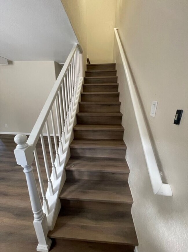 Building Photo - Low elevation condo in small complex with garage