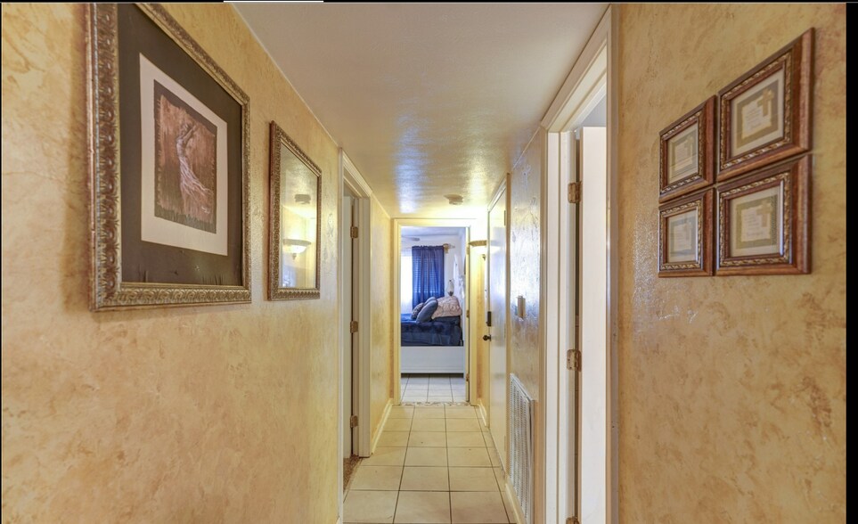 hall, left room 2, right bath 1, straight Master Bed - 518 Westshire Dr