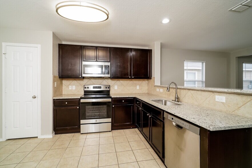 Building Photo - 818 Cowhide Dr