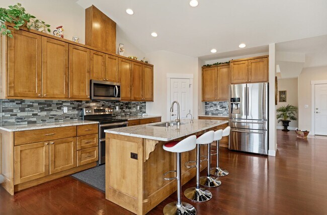 Building Photo - 3-bedroom, 2-bathroom home featuring an op...
