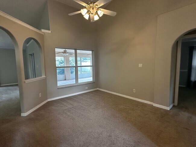 Building Photo - Coming Available Soon - 3/2 Split Plan Home in Eustis with Screened Porch!