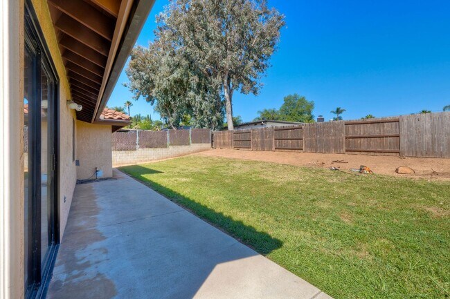 Building Photo - Corner Lot 4BR with Vaulted Ceilings & Big Yard