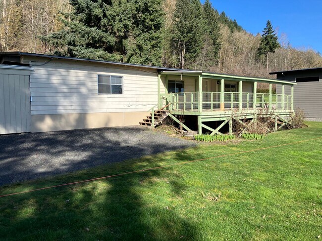 Building Photo - Columbia Riverfront Home with 1 Acre of Landscaped Yard