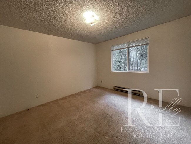 Building Photo - Spacious Duplex with Covered Porches & Garage